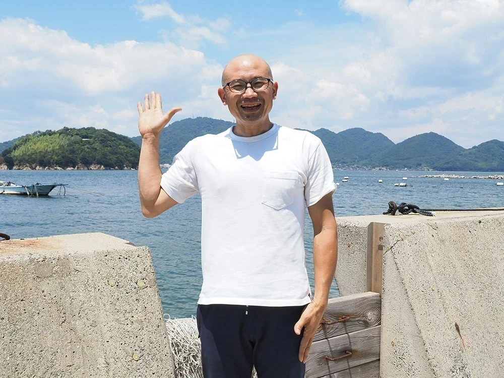 平岡 顕治さん