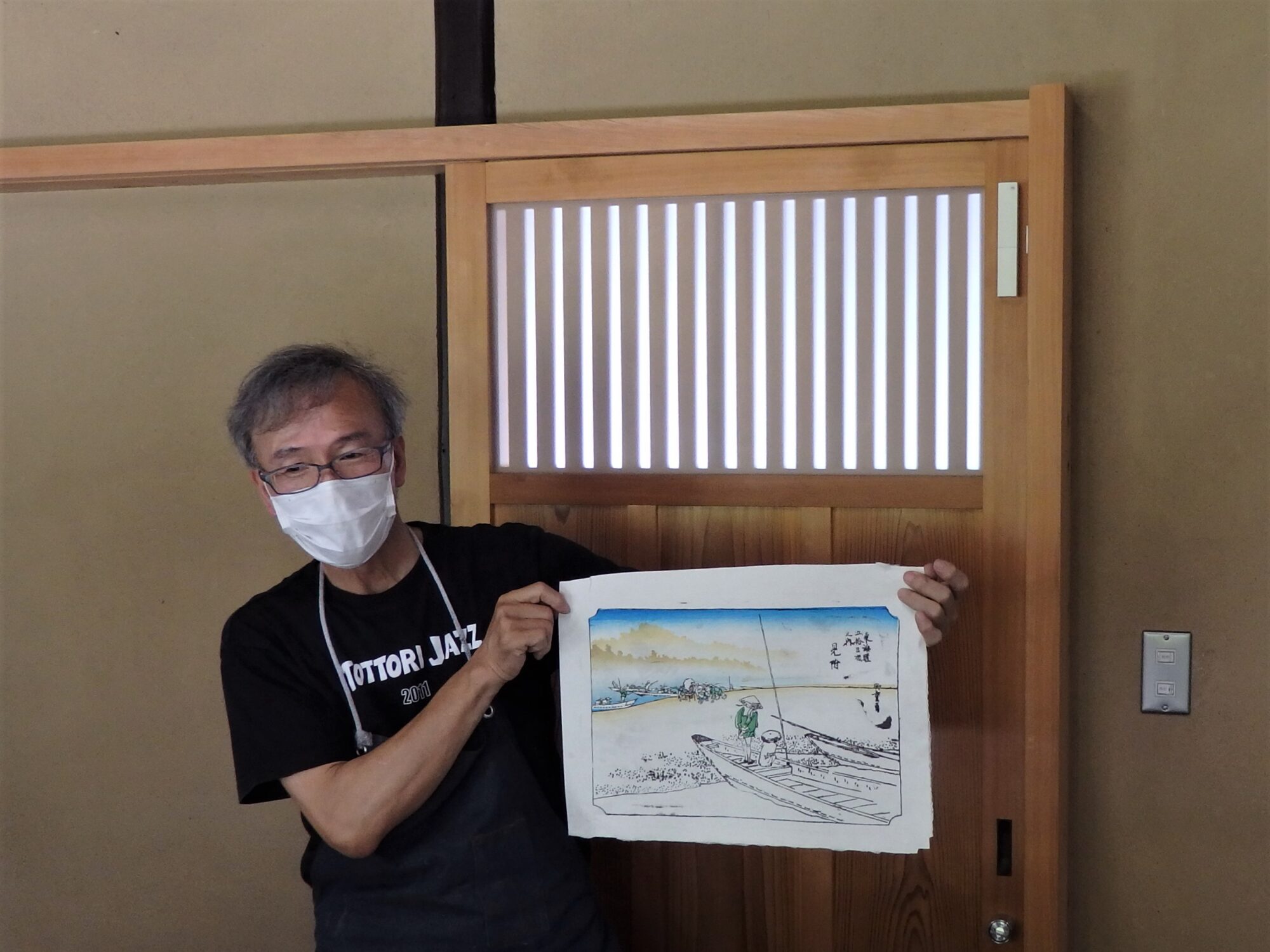 徳持氏の摺り実演(上向き)